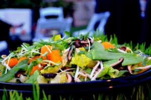 Fresh Asian salad with greens and cabbage and carrots at catered corporate events